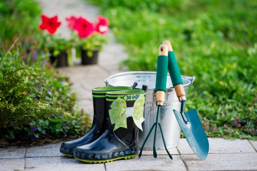 Gardener assessing a lawn with clipboard